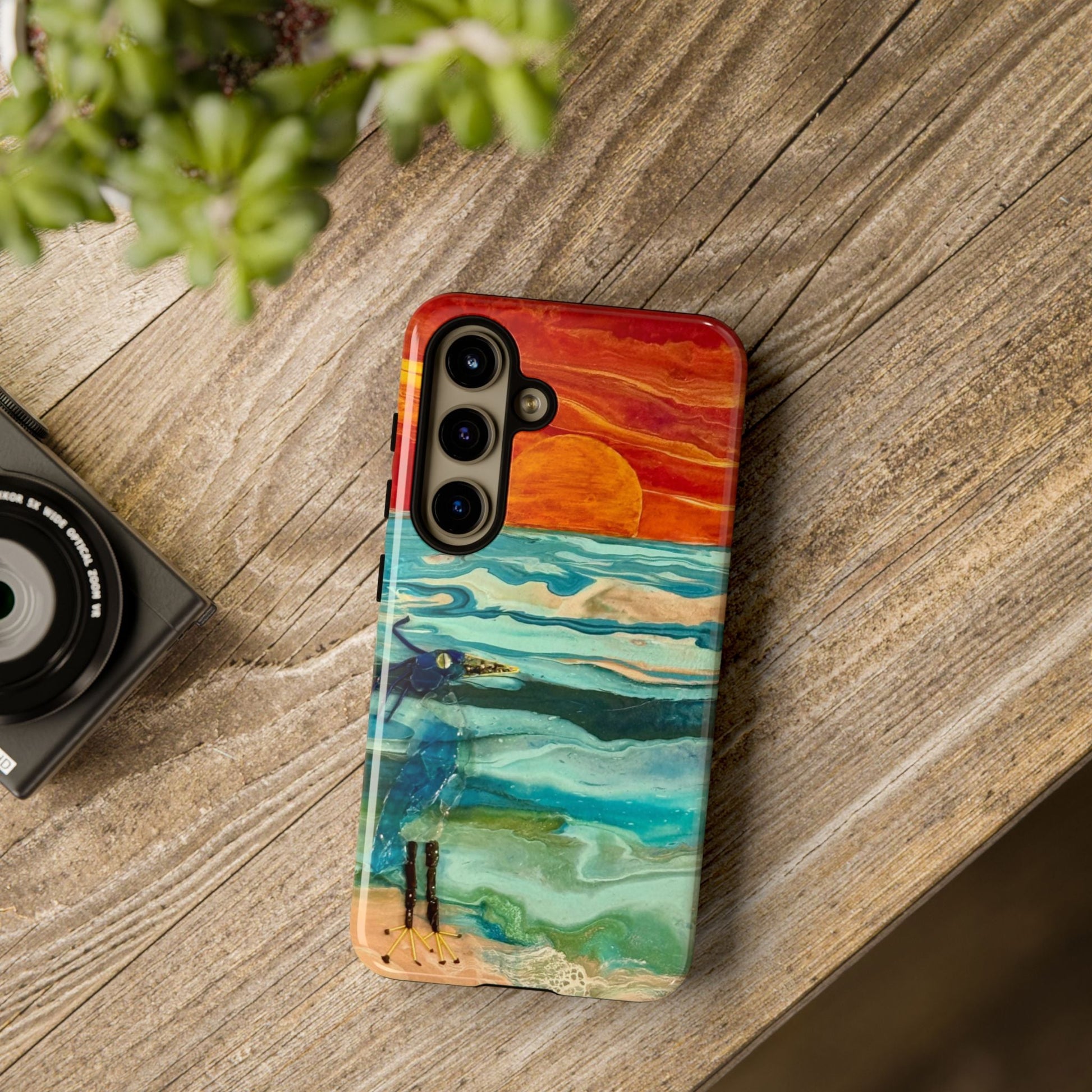 Blue Heron at Sunset Phone Case on a desk