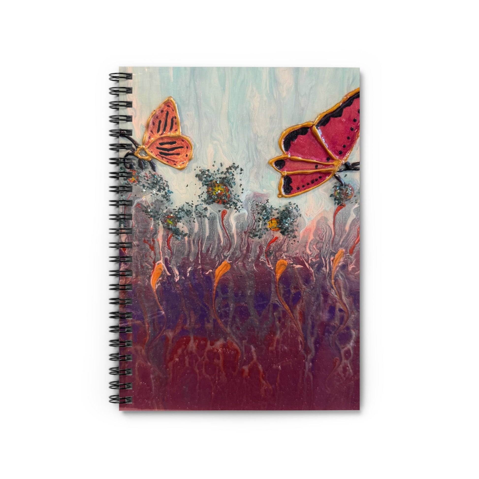 Custom art notebook cover showing butterflies in a garden.